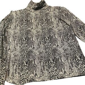 SML size large turtle neck animal print shirt great look